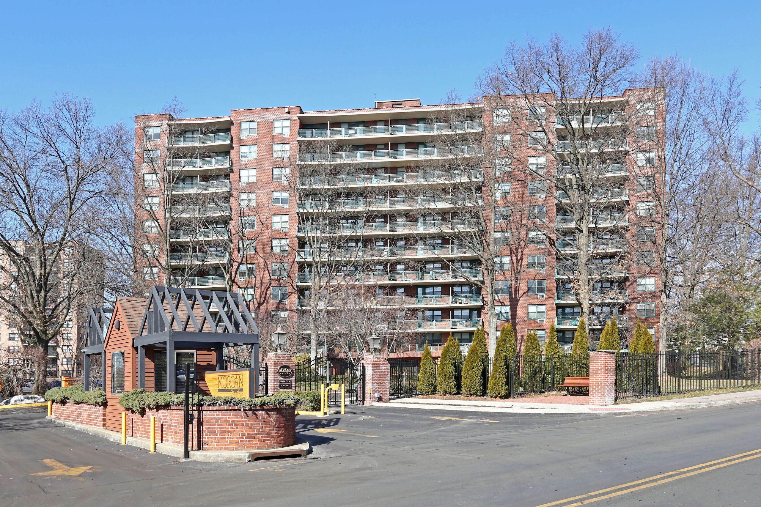 203 Living - The Morgan residential rental building with balconies in gated community in Stamford