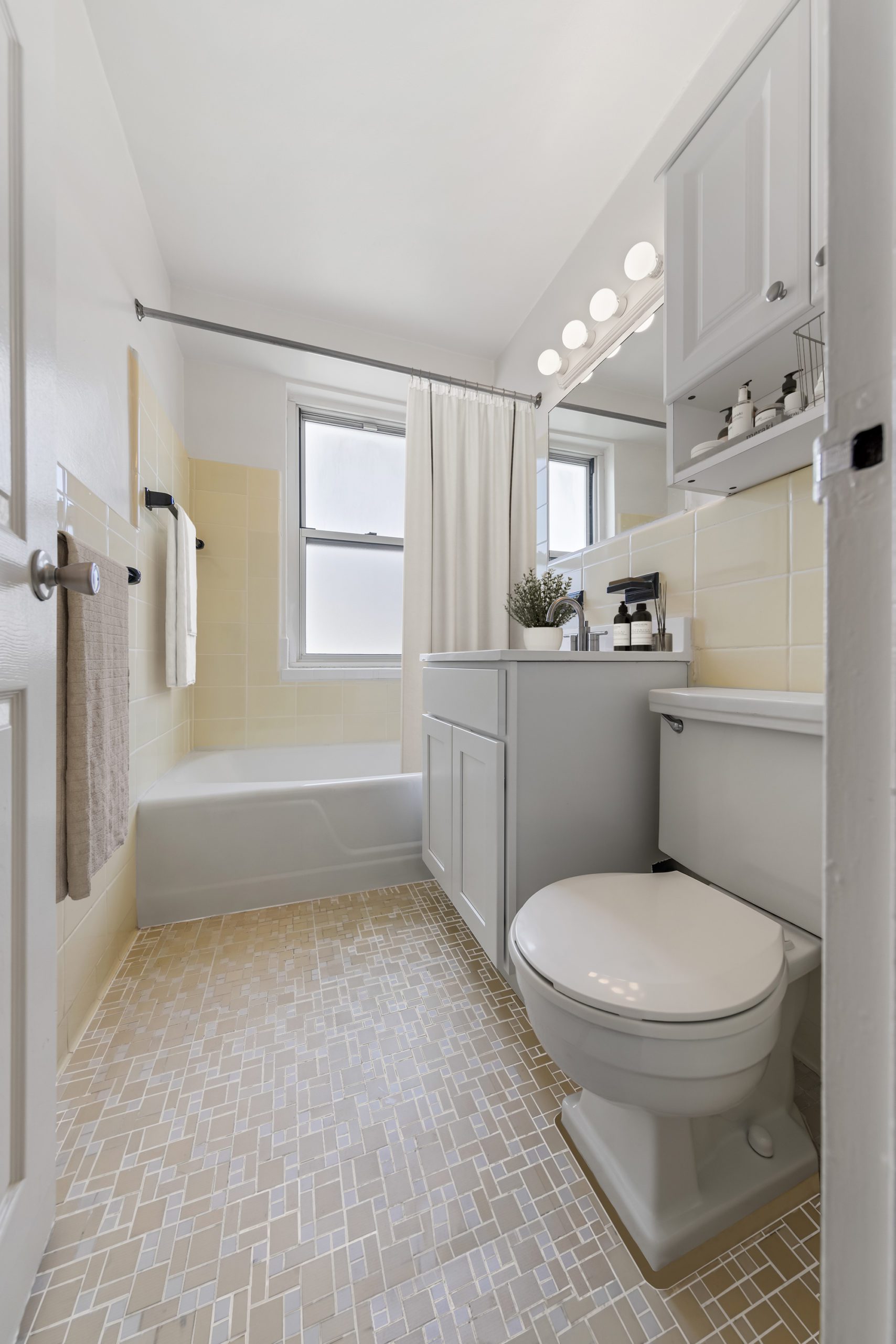 203 Living - The Morgan rental apartment tiled windowed bathroom in Stamford, CT